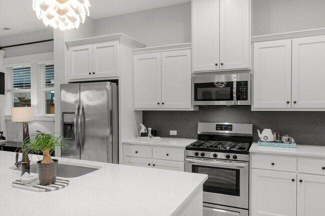 Building Photo - Modern Comfort Meets Timeless Style in the...