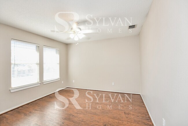 Building Photo - The living is easy in this gorgeous 4BR, 2.5BA brick home