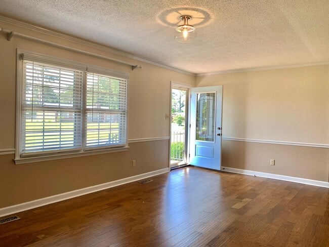 Building Photo - Charming Updated Home, Quiet Street Near Base, Fenced Yard!