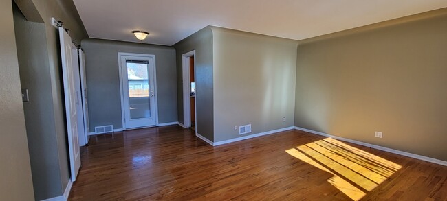 Living Room and Small Dining Area - 7481 W 46th Ave