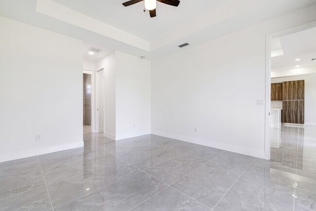 Building Photo - Brand-New Coastal Retreat | 4BR Home in NW Cape Coral