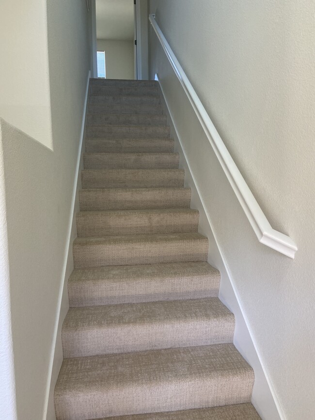 Stairs to bedrooms upstairs - 1506 Jetty Dr