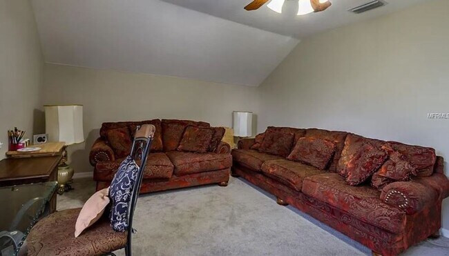 Building Photo - Charming 4-Bedroom Home with Pond Views & ...