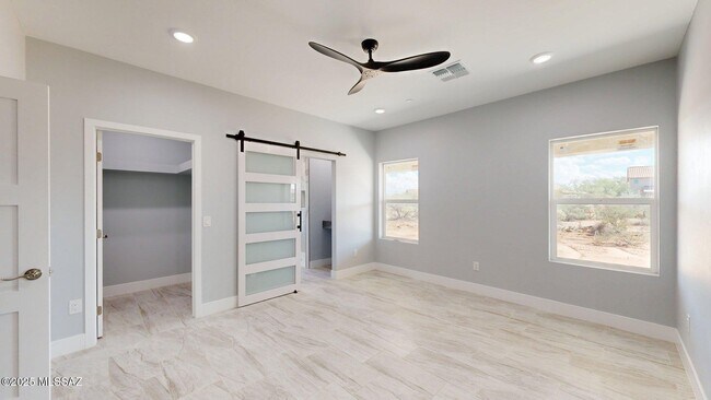Building Photo - 7095 W Los Reales Rd