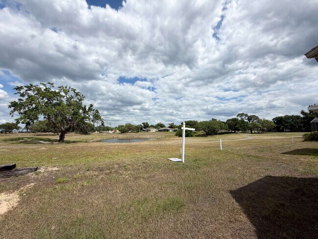 Building Photo - "Unfurnished Home on Golf Course in Hudson, FL - Spacious 1,853 Sq Ft Haven!"