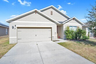 Building Photo - Discover this lovely 4-bedroom, 2-bath home in the sought-after Squires Grove community