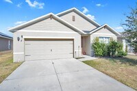 Building Photo - Discover this lovely 4-bedroom, 2-bath home in the sought-after Squires Grove community