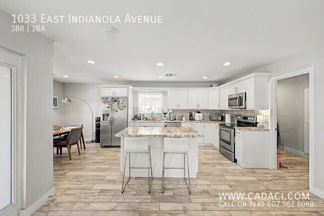Building Photo - 1033 E Indianola Ave