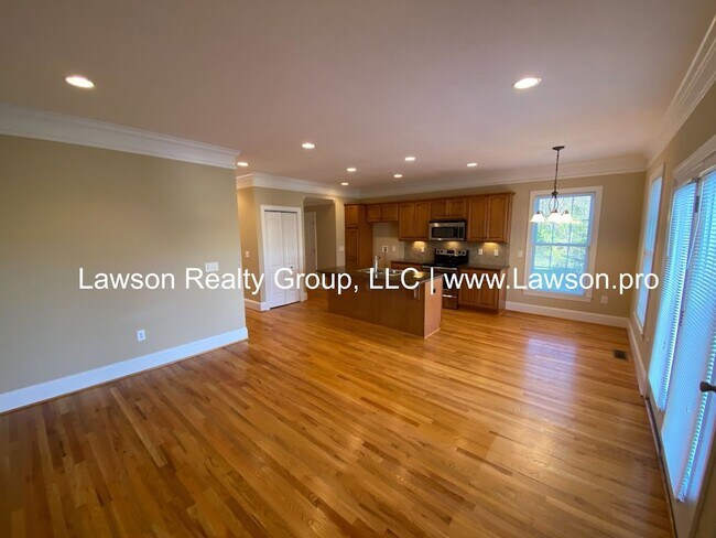 Building Photo - Colonial Green Row Home with Two Car Garage