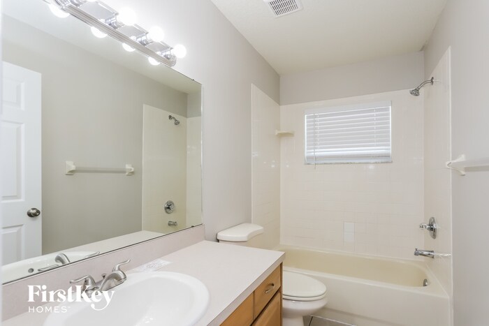 Building Photo - 4501 Compass Oaks Dr