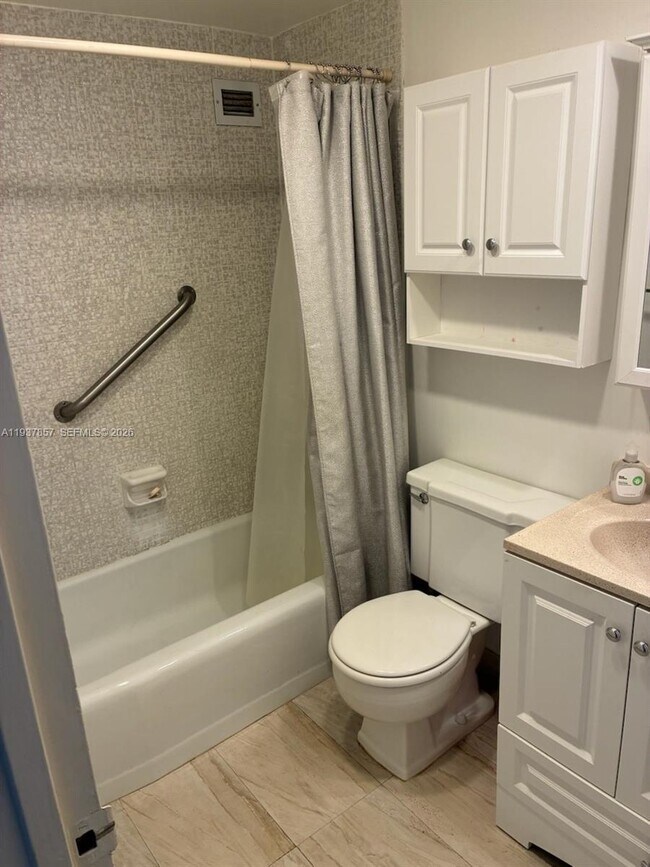 Building Photo - 10185 Collins Ave