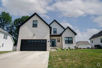 Building Photo - Pet Friendly Four Bedroom with Bonus!