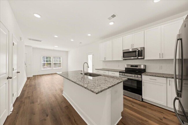 Building Photo - BRAND NEW TOWNHOUSE!!