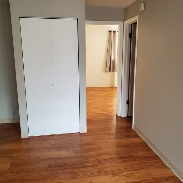 Large Living room with coat/linen closet - 3161 Madison Ave