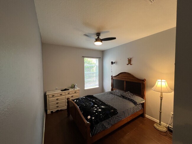 Building Photo - "Spacious 4-Bedroom Lutz Home with Elegant...