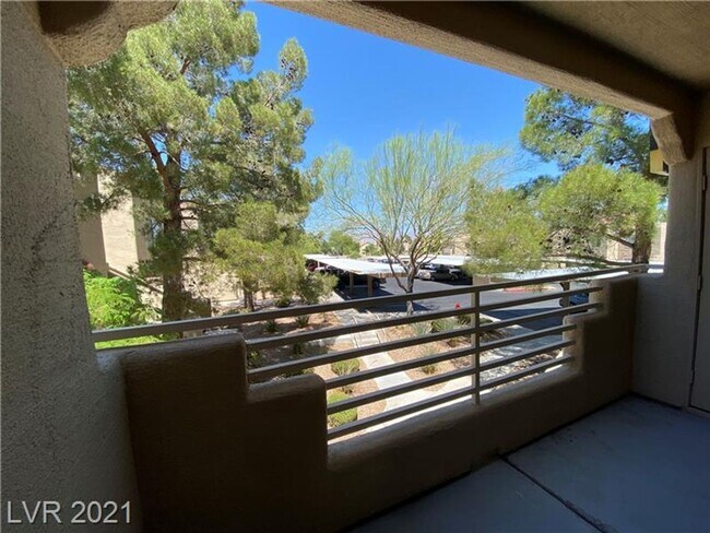 Building Photo - Charming 1-Bedroom Condo in Gated 89128 Co...
