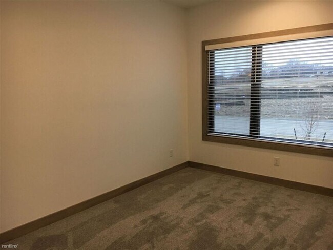 Building Photo - Spacious 4 bedroom/3 bath home with finished lower level and attached 2 car garage
