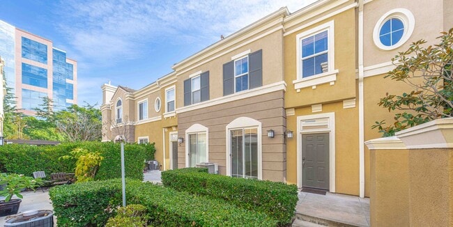 Building Photo - Stunning Upgraded Tri-Level Condo in South Coast Metro’s Exclusive Vantage Community