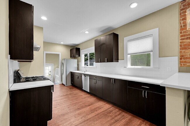 Building Photo - $3,500.00- Charming and Updated 4 bed, 3 bath Home in West Highland Denver!