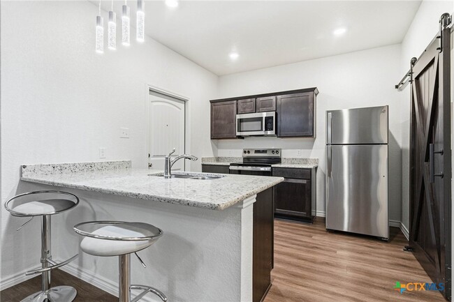 Building Photo - 5200 Rose Petal Ct