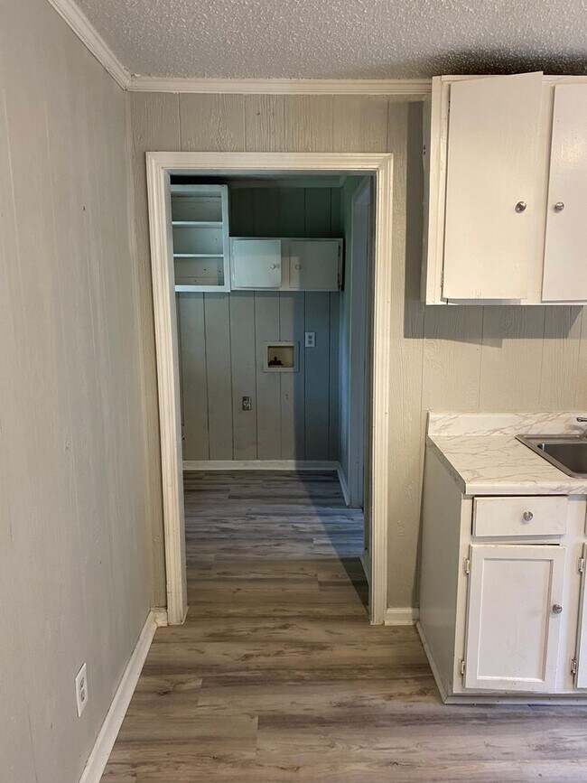 Building Photo - 2 Bedroom Home  with Fenced In Backyard 199.00 first month's rent