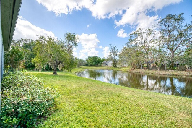 Building Photo - 2 Bedroom Plus Den/Office Home - Relaxing Pond View and Pet Friendly