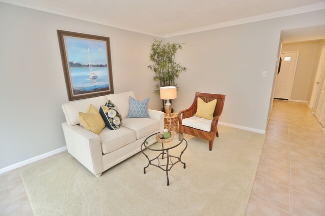 Building Photo - MUST SEE! Charming 3-Bedroom Townhome in Thoroughgood! 1-Car Attached Garage!