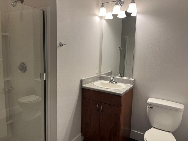 Building Photo - Yesler Place | Top Floor 0BD/1BA New Floor...