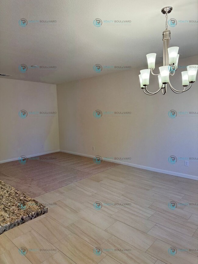 Building Photo - Luxury and Convenience Fully Equipped 3-Bedroom 2.5 Bathroom 2 Car Garage Townhome in Carson City