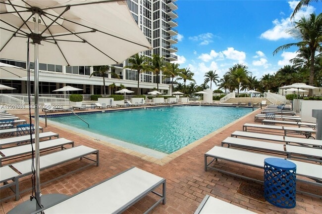 Building Photo - 10275 Collins Ave