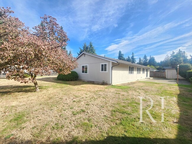 Building Photo - Spacious 4-Bedroom Rambler with Fenced Yar...