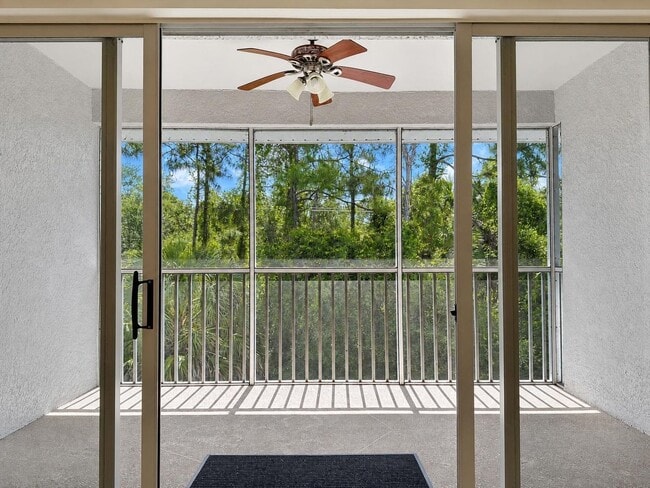 Building Photo - Peaceful Preserve-View Condo in Gated Blue Heron