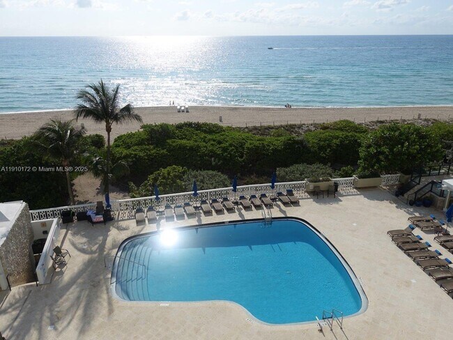 Building Photo - 5555 Collins Ave