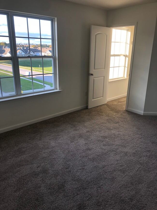 Building Photo - Coming soon - 3 bedroom, 2.5 bath condo in...