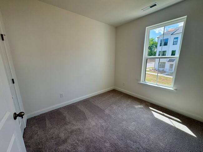 Building Photo - Beautiful New Construction, Three Story To...
