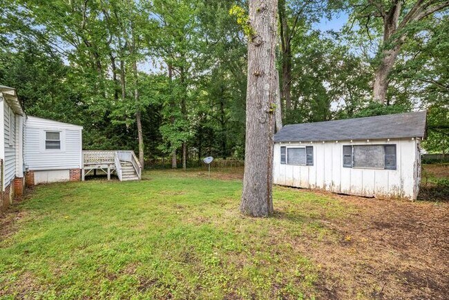 Building Photo - Adorable Home, Just Painted, Wood Flooring...