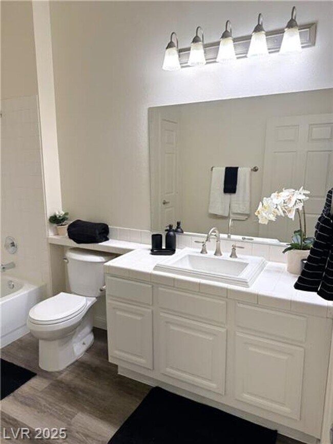 Building Photo - Well-maintained condo located in a convenient Southwest Las Vegas community. Attached 2 car garage.