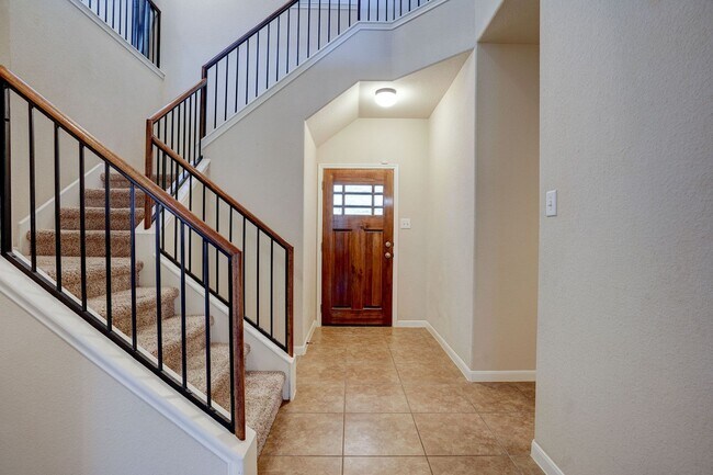 Building Photo - Bright & Roomy 4BR • 2.5BA • Two-Level Living