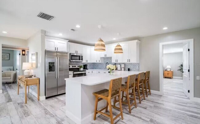 Building Photo - Utilities Included - (DECEMBER ONLY) Furni...