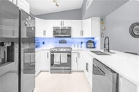 Building Photo - 8274 Key Royal Cir