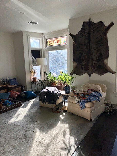Living room with natural light. - 1730 N Franklin Pl