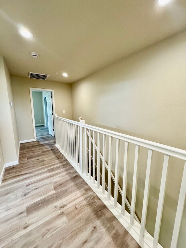 Building Photo - Stunning New Build 3-Bedroom, 2.5-Bath Triplex Apartment for Rent