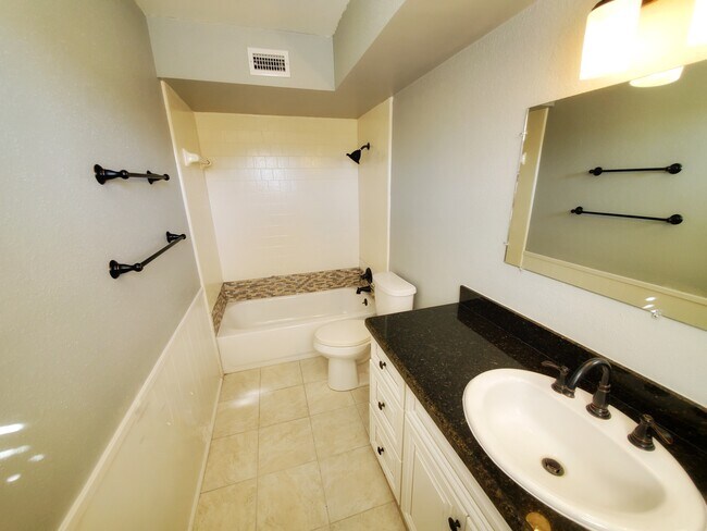 En suite bathroom for second primary. - 37438 Meadowview Dr