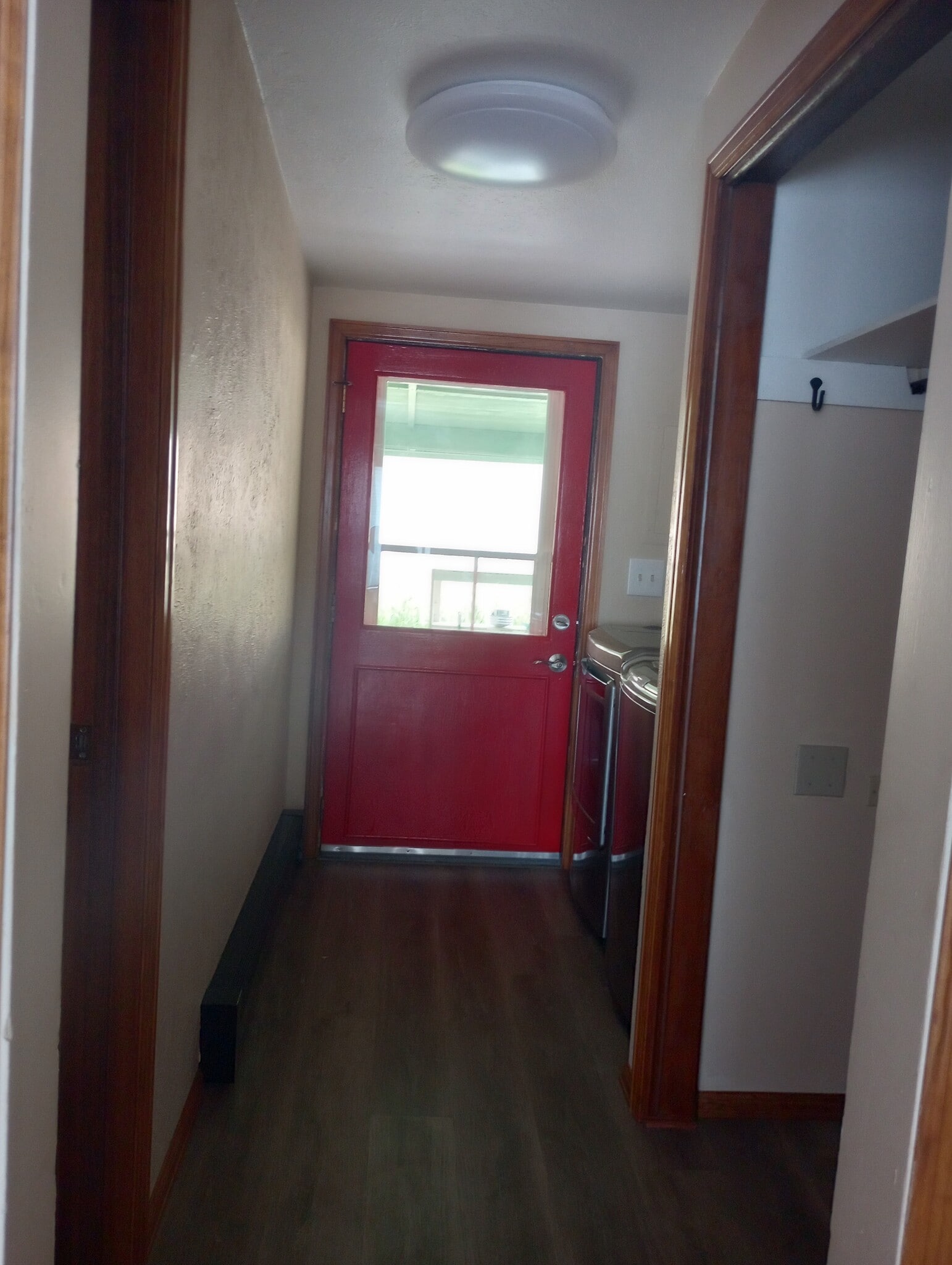 From kitchen to laundry room, which opens to back porch. - 28057 Knowles Rd