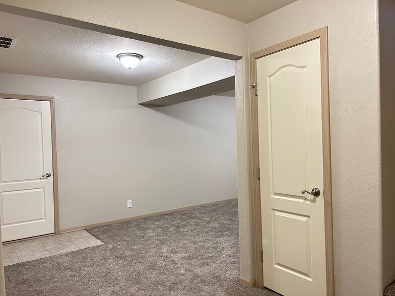 Downstairs rec room / home office - 1211 NW Ashley Ln