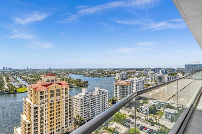 Building Photo - Stunning High-Rise Condo with Ocean Views | Prime Beach Location
