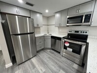 Building Photo - Annual** 55+ Years Old Required ** Recently Renovated ** 1 Bedroom / 1 Bath - Cambridge House - $...