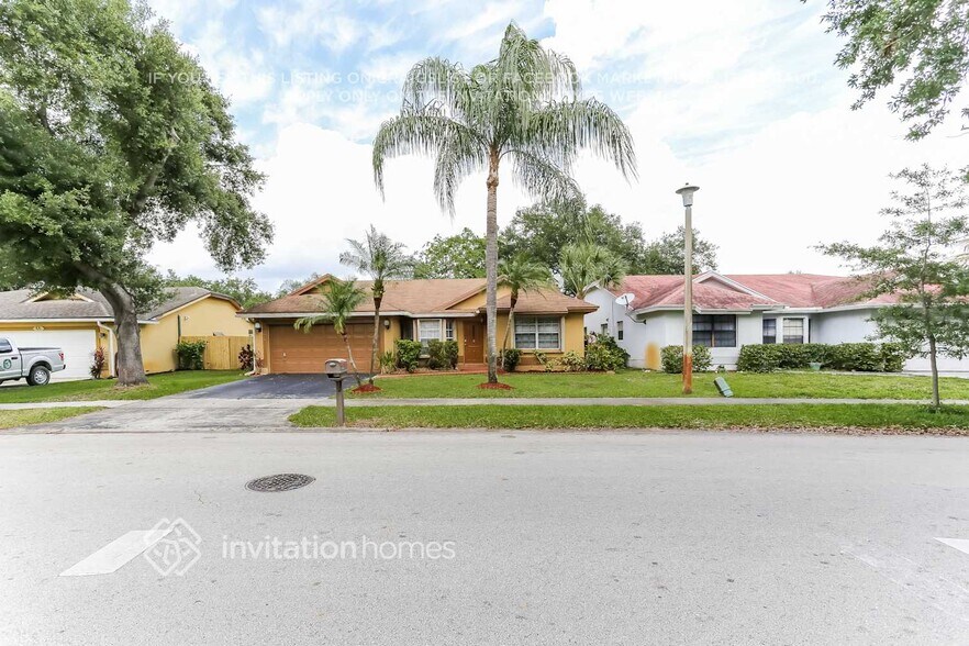 Building Photo - 9575 NW 25th Ct