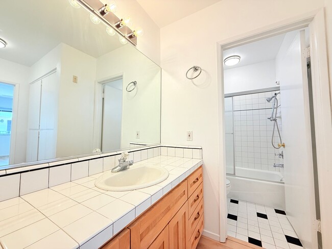 Building Photo - Stylish & Spacious 2-Bedroom Condo for Ren...