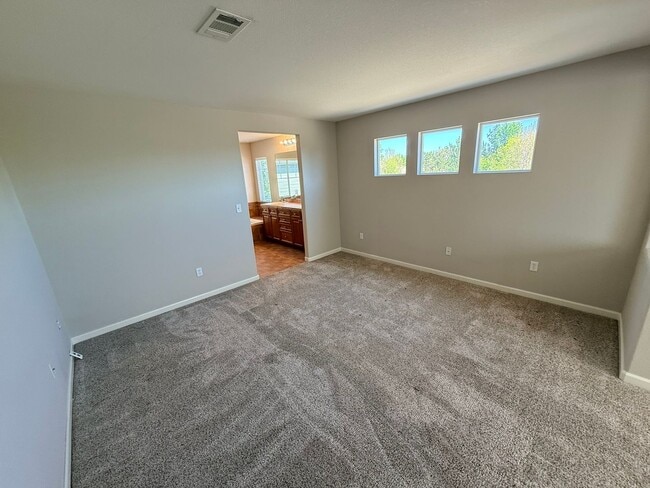 Building Photo - Modern 4-Bedroom Home in Renaissance Neighborhood Near Trails